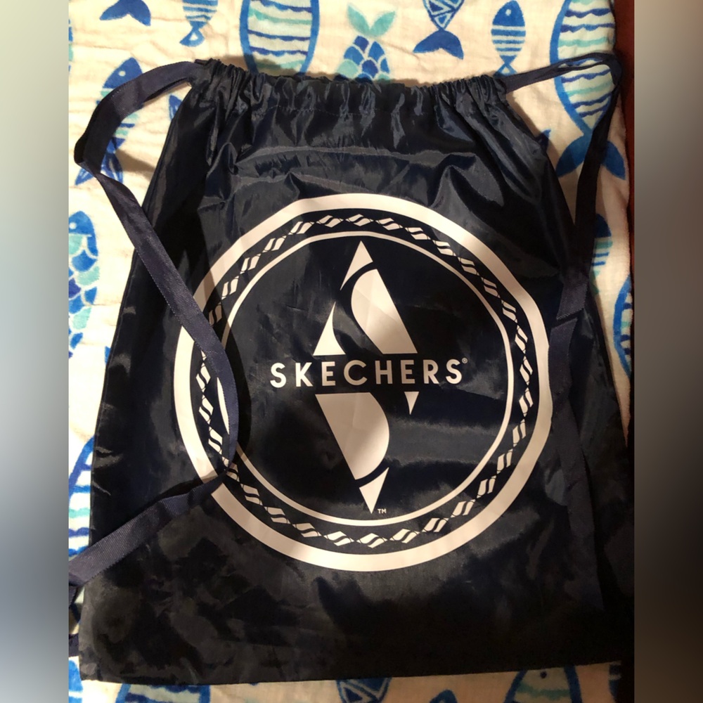 #bag 1 Skechers Navy Drawstring Backpack with White Logo Emblem
